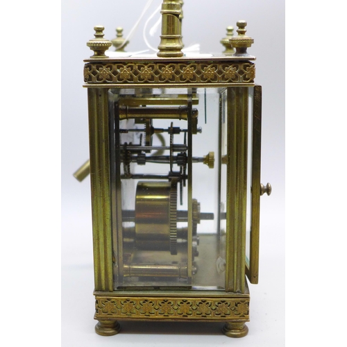 804 - A brass and four glass sided carriage clock with cylinder escapement