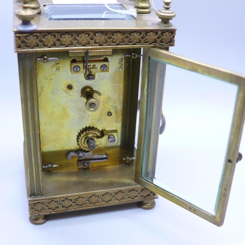 804 - A brass and four glass sided carriage clock with cylinder escapement