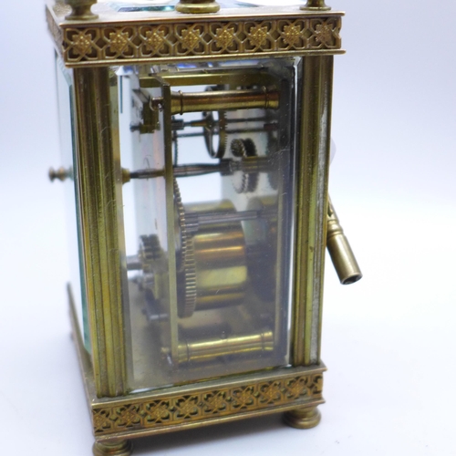 804 - A brass and four glass sided carriage clock with cylinder escapement