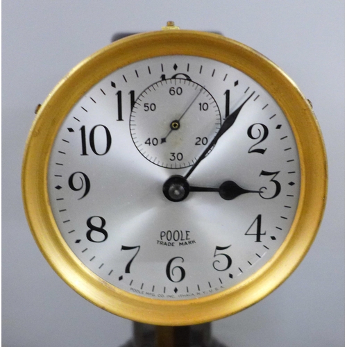 805 - A rare Poole USA electromagnetic hip toggle clock with Bakelite base **PLEASE NOTE THIS LOT IS NOT E... 