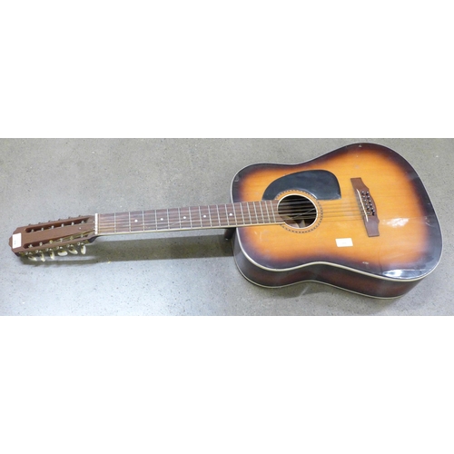 810 - A 12 string acoustic guitar, Rolie, made in Spain