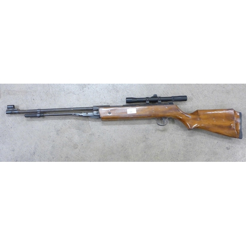 813 - A 0.22 calibre air rifle and scope **PLEASE NOTE THIS LOT IS NOT ELIGIBLE FOR IN-HOUSE POSTING AND P... 