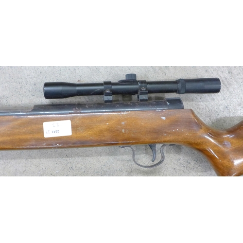 813 - A 0.22 calibre air rifle and scope **PLEASE NOTE THIS LOT IS NOT ELIGIBLE FOR IN-HOUSE POSTING AND P... 