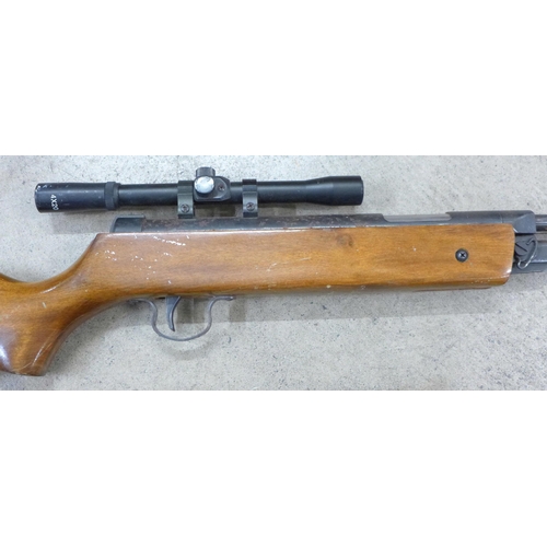 813 - A 0.22 calibre air rifle and scope **PLEASE NOTE THIS LOT IS NOT ELIGIBLE FOR IN-HOUSE POSTING AND P... 