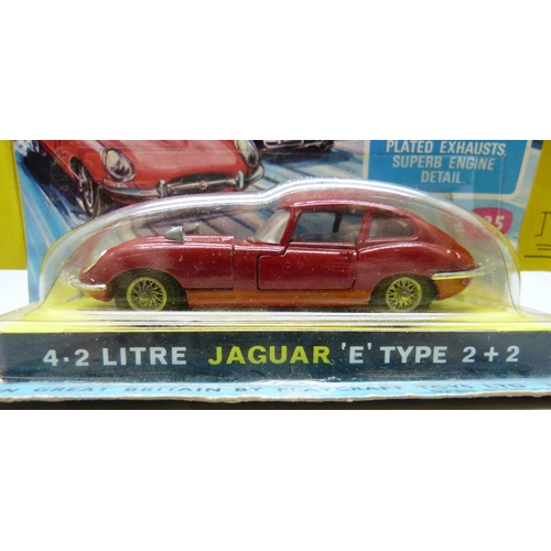 821 - A Corgi Toys 335 E Type Jaguar, with packaging