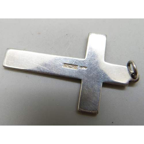 829 - An engraved silver bangle and a silver cross, 3.5cm bangle width, 72g total