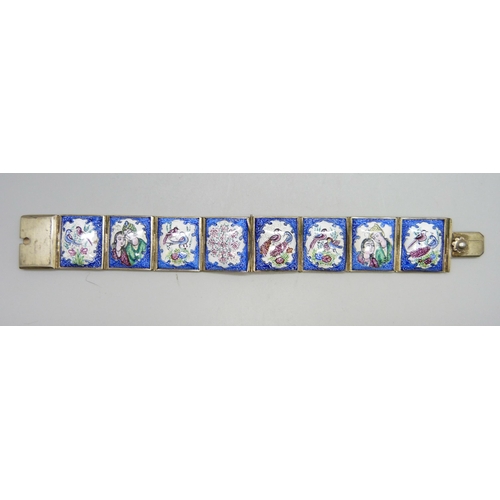 830 - An enamel panel bracelet with hand painted decoration, one panel frame a/f, 19cm