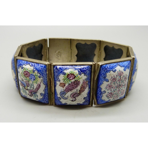 830 - An enamel panel bracelet with hand painted decoration, one panel frame a/f, 19cm