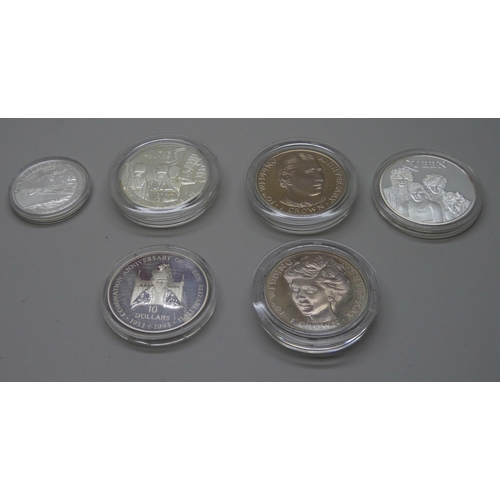 843 - A collection of silver proof crowns and coins including commemorative, and other coins, two with cer... 