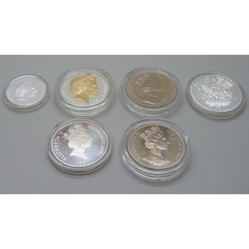 843 - A collection of silver proof crowns and coins including commemorative, and other coins, two with cer... 