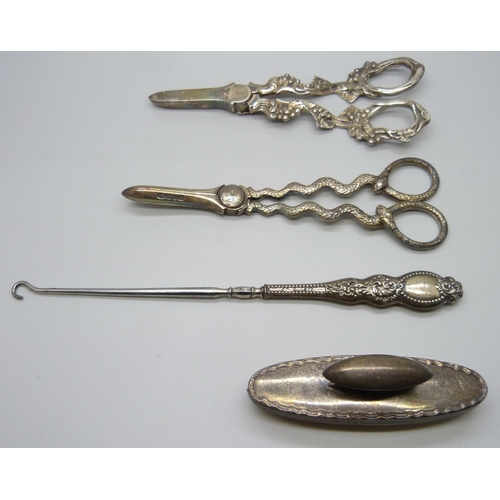 854 - Two pairs of plated grape scissors, one with snake handles, the other with bunches of grapes, a silv... 