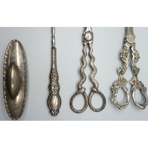 854 - Two pairs of plated grape scissors, one with snake handles, the other with bunches of grapes, a silv... 