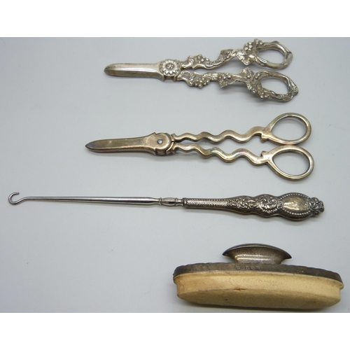 854 - Two pairs of plated grape scissors, one with snake handles, the other with bunches of grapes, a silv... 