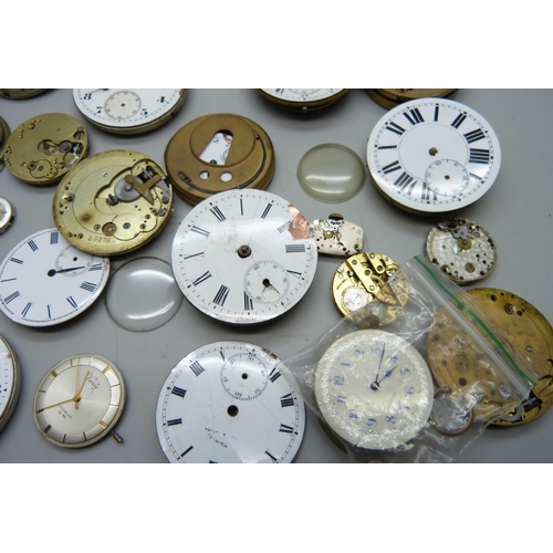 875 - A collection of pocket watch and wristwatch movements and parts, etc.