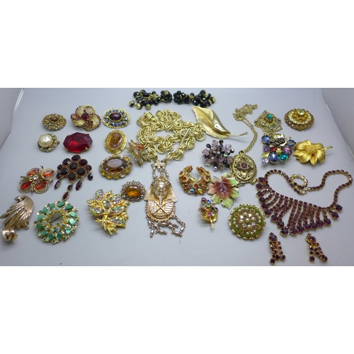 890 - A collection of costume jewellery including paste set brooches