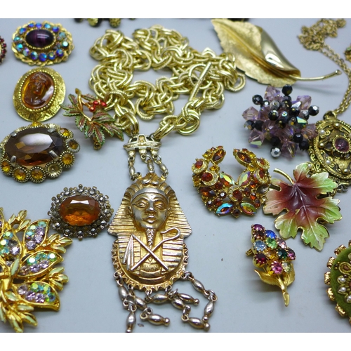 890 - A collection of costume jewellery including paste set brooches