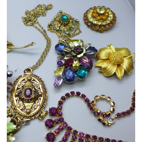 890 - A collection of costume jewellery including paste set brooches