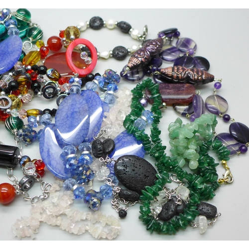 899 - A collection of glass and gemstone jewellery