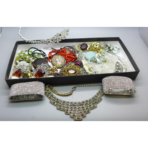 900 - A collection of costume jewellery together with a silver ring and a silver mounted necklace