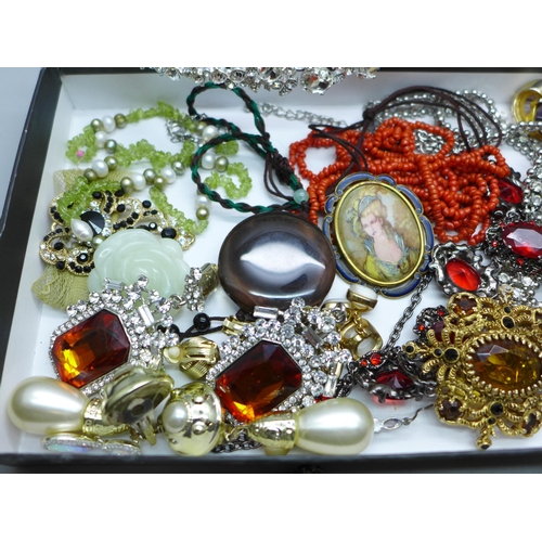 900 - A collection of costume jewellery together with a silver ring and a silver mounted necklace