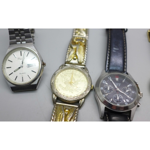 901 - A Michael Kors lady's watch, two Fossil wristwatches, DKNY, etc.