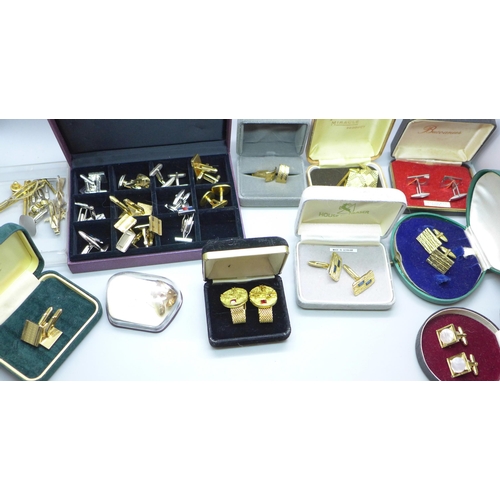 912 - A collection of cufflinks and tie pins