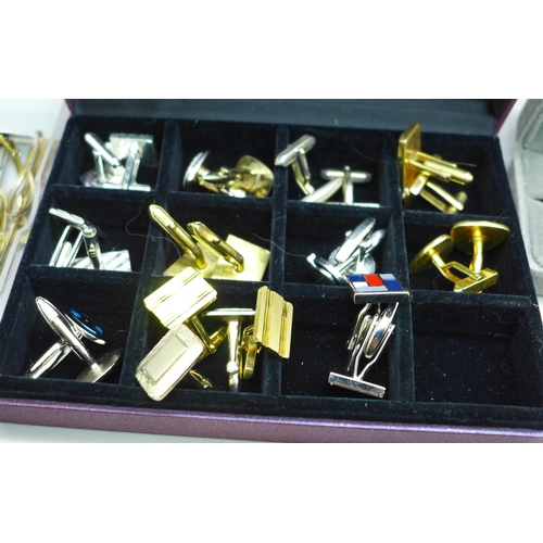 912 - A collection of cufflinks and tie pins