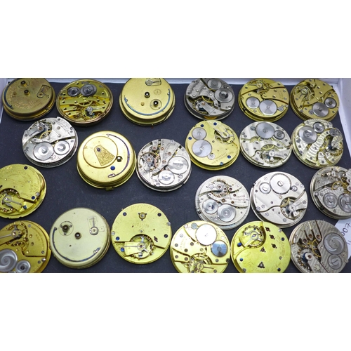 913 - A collection of pocket watch movements and dials, including Waltham, J.W Benson, Elgin, etc.