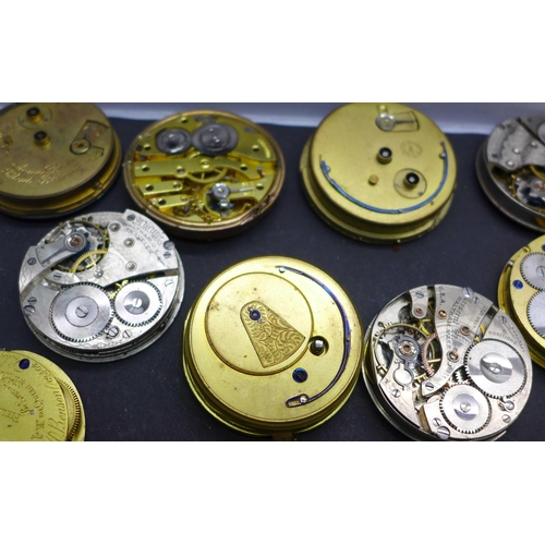 913 - A collection of pocket watch movements and dials, including Waltham, J.W Benson, Elgin, etc.