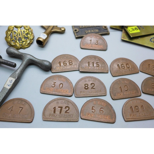 919 - A collection of machine tag plates, machine keys, pit chips, an RAF badge, driving licence, vesta ca... 