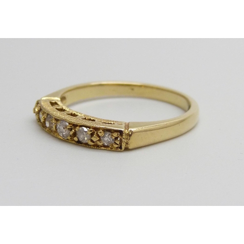 926 - An 18ct gold ring set with five old cut diamonds, 3g, N