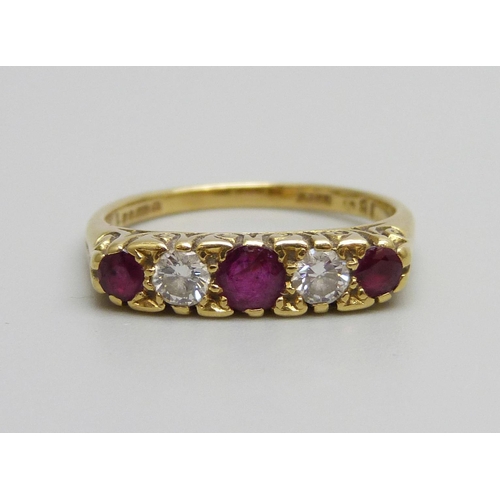 929 - An 18ct gold, ruby and diamond ring, London, 1986, 3.4g, M/N