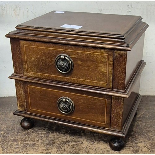 375 - An Edward VII inlaid mahogany lady's jewellery chest