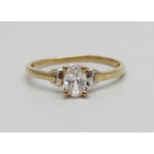 947 - A 9ct gold ring set with a white stone, 1.1g, N