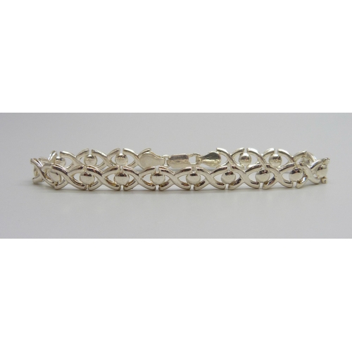 949 - A silver fancy link bracelet, 18.5cm, 7g