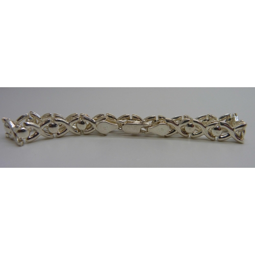 949 - A silver fancy link bracelet, 18.5cm, 7g