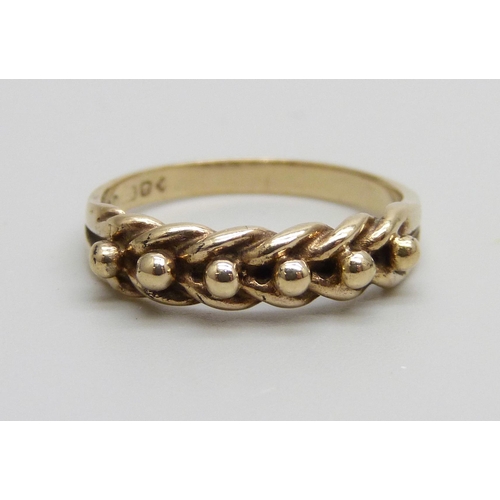 957 - A 9ct gold keeper ring, 2.3g, N