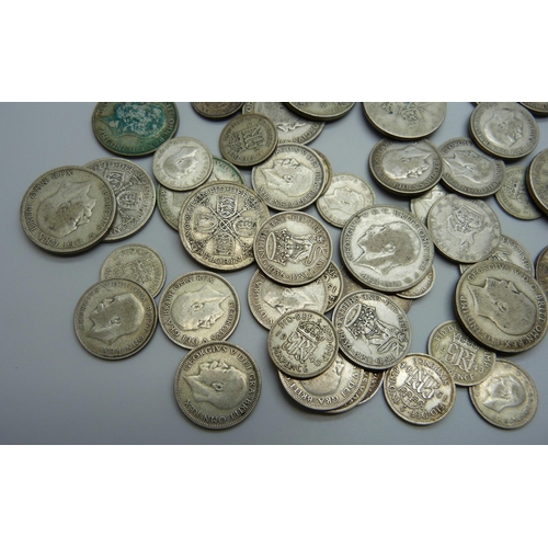 968 - A collection of half silver coins, 370g, together with three earlier coins