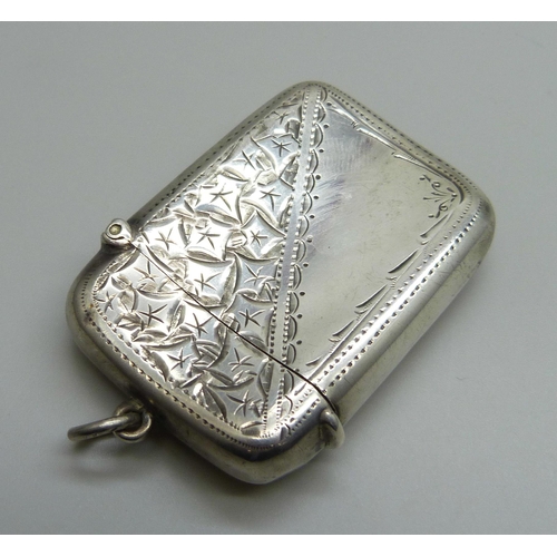 970 - A silver vesta case with engraved decoration, Birmingham, 1904