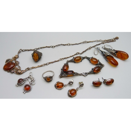 976 - A collection of silver and amber set jewellery, 42g, together with an unmarked bracelet and earrings