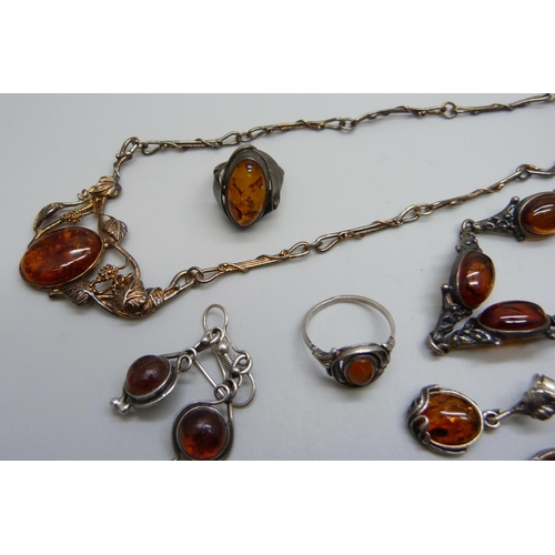 976 - A collection of silver and amber set jewellery, 42g, together with an unmarked bracelet and earrings