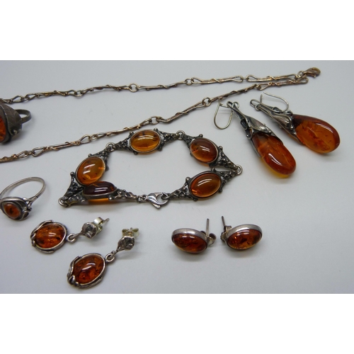 976 - A collection of silver and amber set jewellery, 42g, together with an unmarked bracelet and earrings