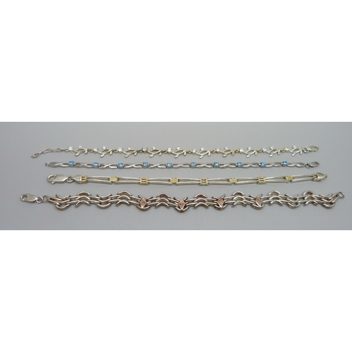 979 - Four silver bracelets, 37g