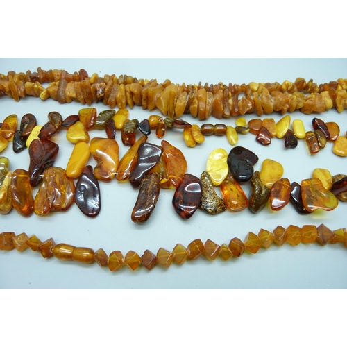 983 - Three amber and amber style necklaces, 130g