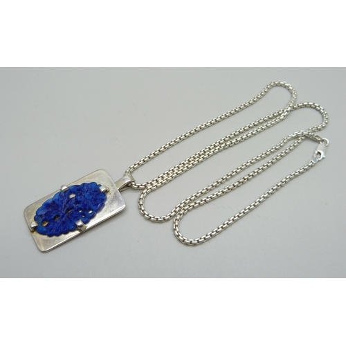 987 - A silver pendant & chain set with a carved blue Oriental style plaque, 32g, 2.2 x 4.5cm