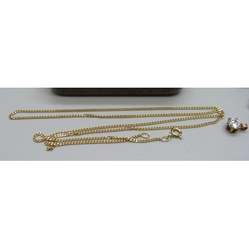 989 - A 9ct gold chain, 2.4g, together with a collection of pearl earrings including a pair of 9ct white g... 