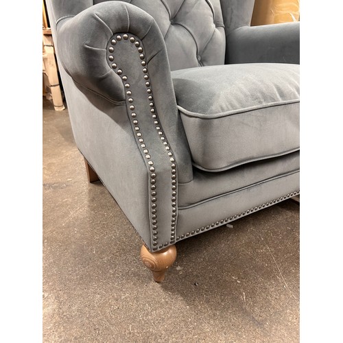 3103 - A Buckingham wing chair in Pewter *This lot is subject to VAT