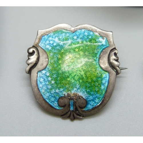 992 - A silver and enamel brooch possibly by James Fenton (marks worn), a Charles Horner enamel pendant, a... 