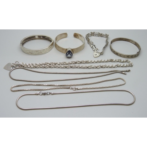 993 - A collection of silver bangles, bracelets and chains, 111g, together with a silver necklace with pla... 