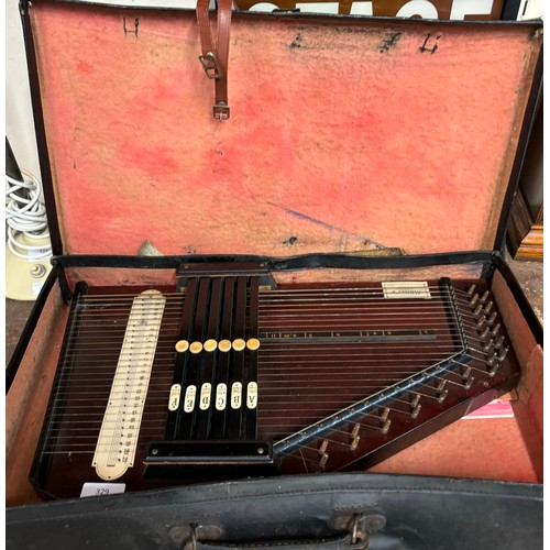 329 - A cased Mullers Autoharp